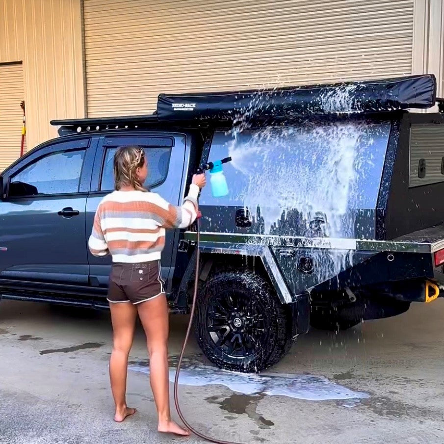 Foam Gun spraying thick foam onto a 4WD using Beach 2 Clean detergent with garden hose connection