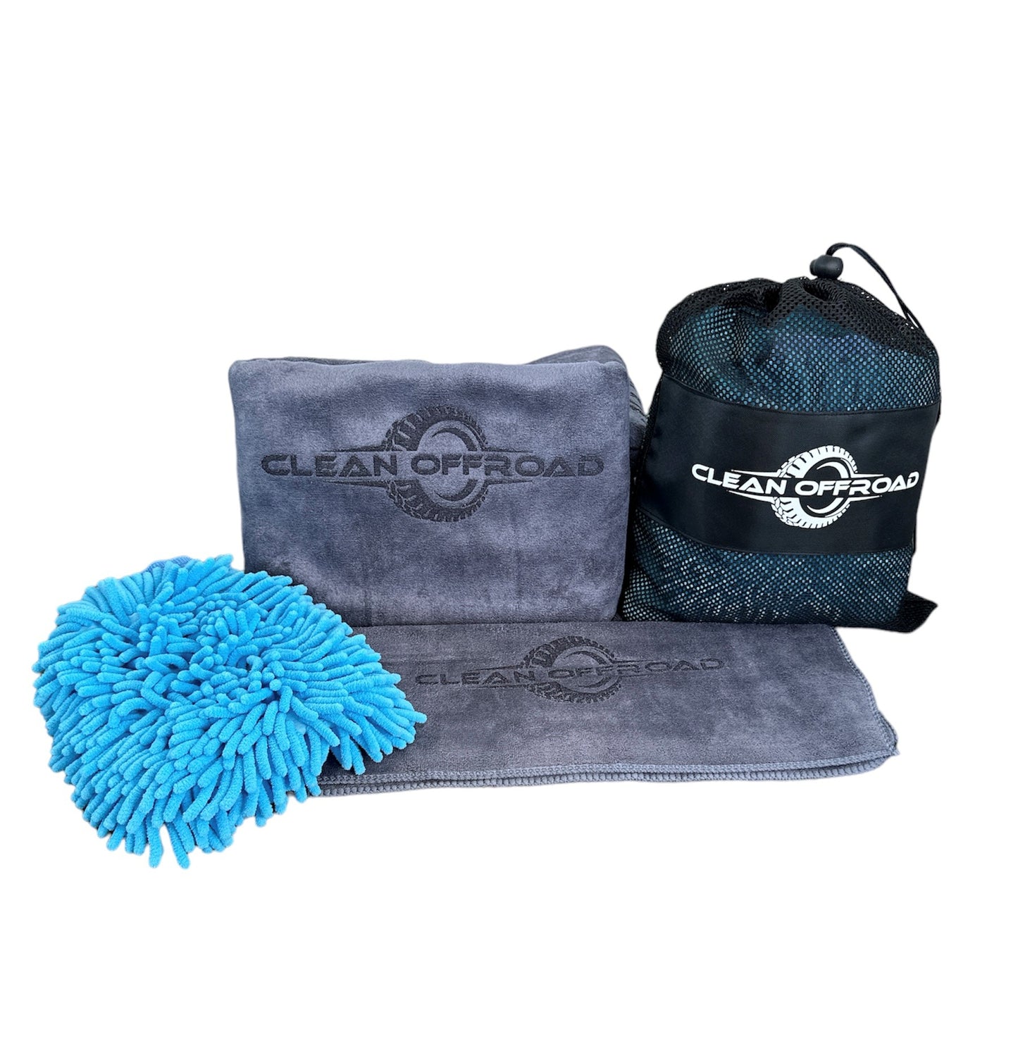 Oversized microfibre drying towel quickly drying a 4WD surface after foaming and rinsing